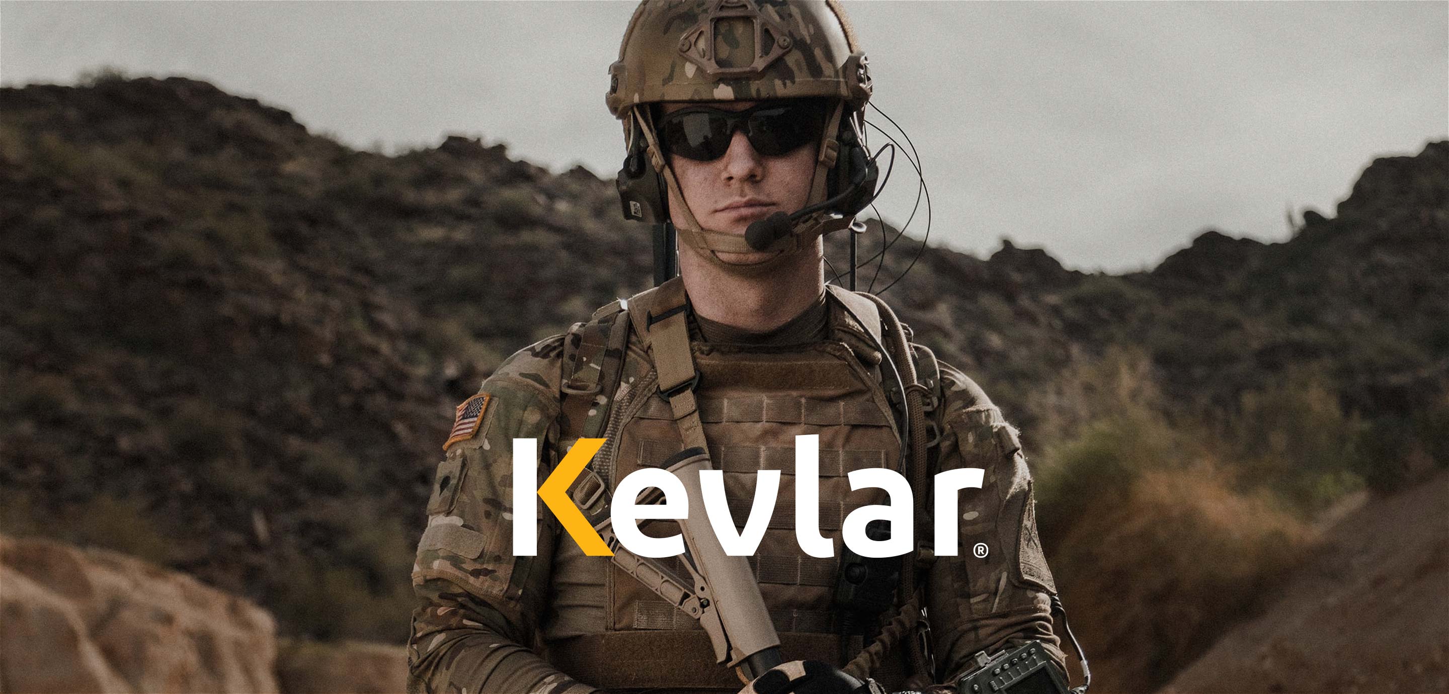 A military service member depending on the advanced ballistic protection of Kevlar® in a helmet and body armor solution